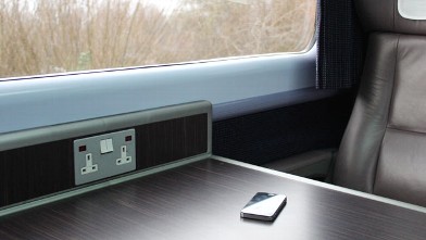 PHOTO: Smart phone on train table.