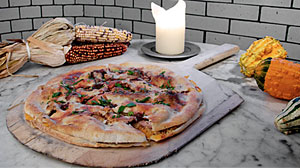 Photo: Manhattan?s La Bottega Italian restaurant has found the perfect use for Thanksgiving feast leftovers: a pizza stuffed more heavily than the holidays turkey