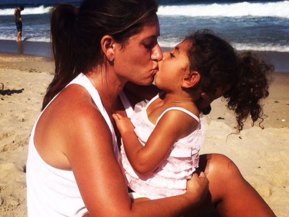 PHOTO: Elit Kirschenbaum holds Ivy on the beach.