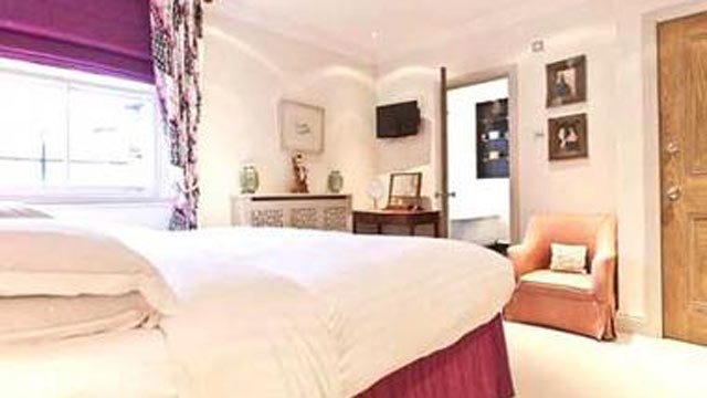 PHOTO: De Vere Gardens Condo has a roof terrace with views out over the rooftops of London, England.