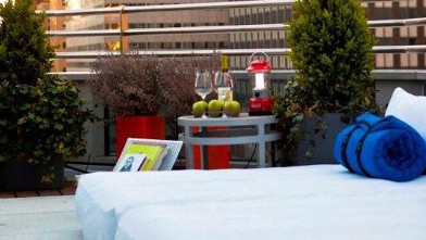 PHOTO: Beds, snacks and wine service are set up on room terraces as part of Hyatt 48 Lex's "Suite Glamping" program.