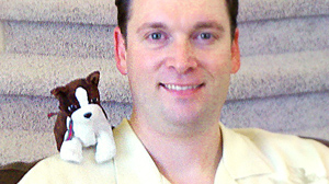 PHOTO When Scott Hardy, 34, hits the road, he always makes sure to leave room in his suitcase for his stuffed animal.
