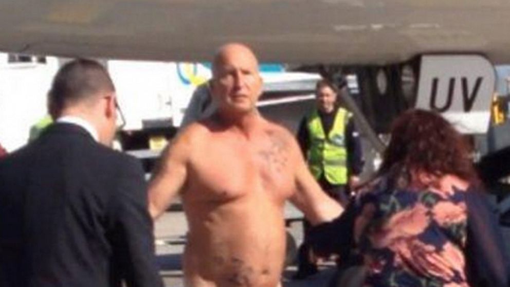 PHOTO: A drunken jet passenger, who had arrived in Manchester on an easyJet flight from Malta, was tasered by police after stripping naked on the airport tarmac and challenging the captain to a fight.