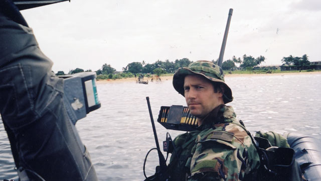 PHOTO: Lt. Denver in Monrovia Harbor, Liberia, 2003." Photograph courtesy of the author. From "Damn Few: Making the Modern SEAL Warrior" Copyright 2013 Rorke Denver