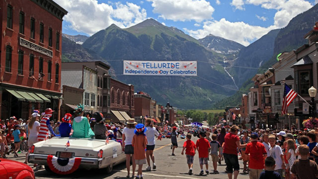 PHOTO: Telluride draws a spirited crowd for a parade, party and firemen's picnic that takes over the downtown strip.