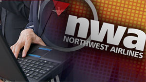 Photo: NORTHWEST CREW WAS ON THEIR LAPTOPS