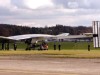 PHOTO Technicians and mechanics stand beside the solar-powered 61 metres (200 feet) wingspan Solar Impulse
