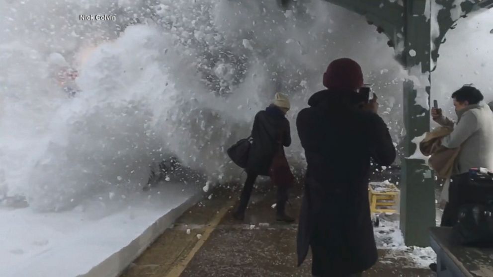 WATCH:  Ultimate snowball fight as train barrels into station
