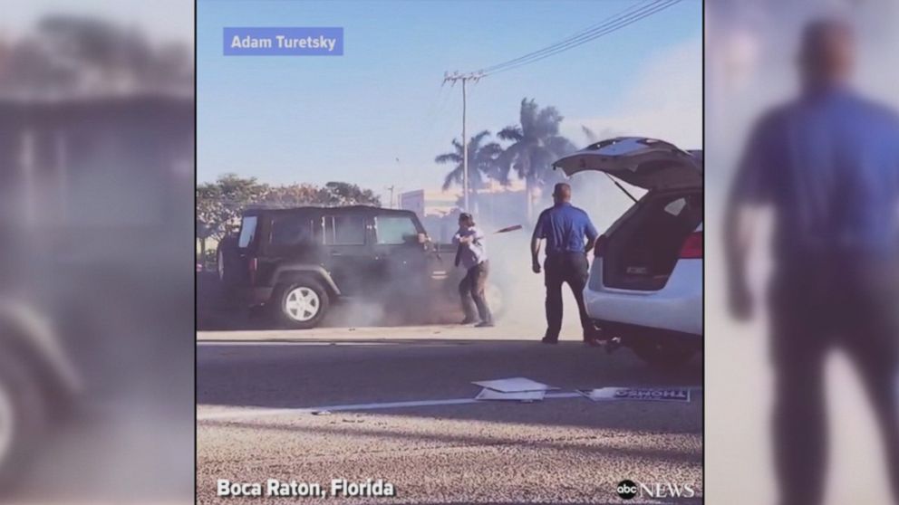 WATCH:  Good Samaritan uses baseball bat to rescue driver