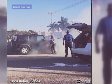 WATCH: Good Samaritan uses baseball bat to rescue driver