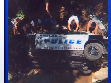 WATCH: Dallas residents help rescue cop after crash
