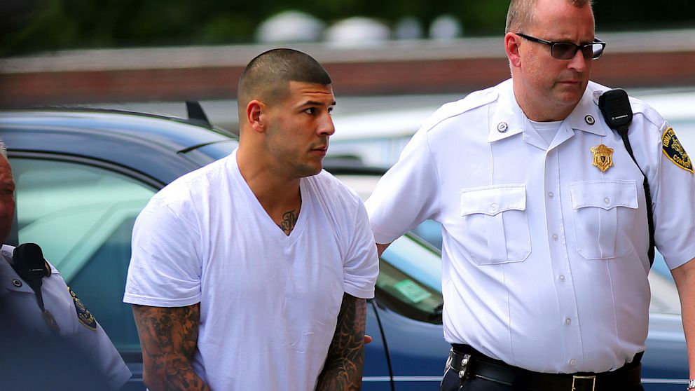 PHOTO: Former New England Patriots player Aaron Hernandez is brought into Attleboro District Court, where Hernandez was charged with murder and five illegal firearms charges in relation to last weeks slaying of Odin Lloyd.