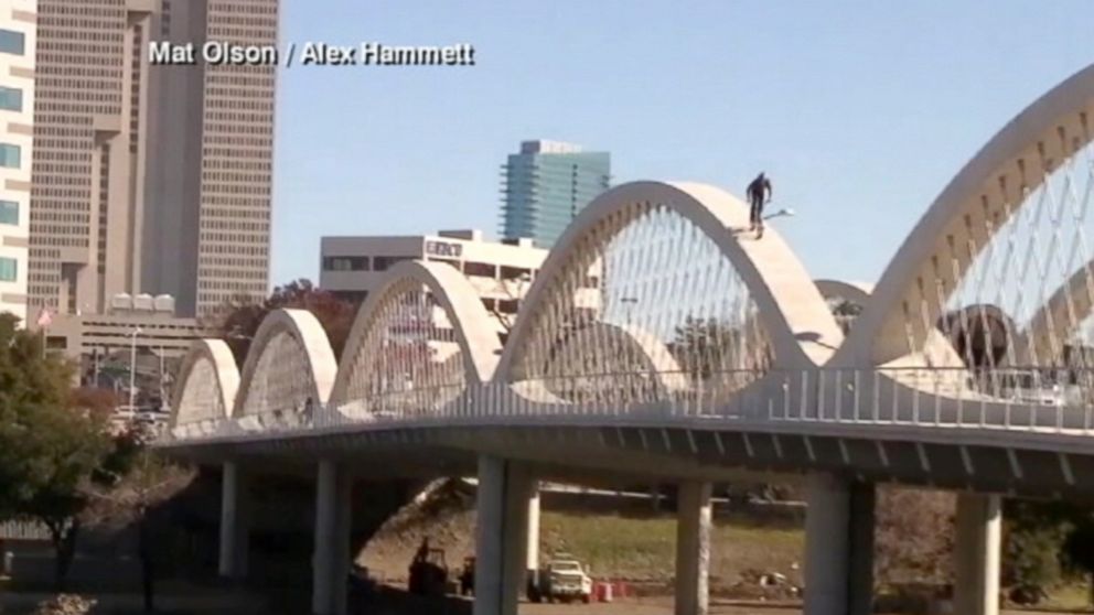 PHOTO: BMX rider Mat Olson scales the arches of the West Seventh Street Bridge in Fort Worth, Texas, Jan. 11, 2014.