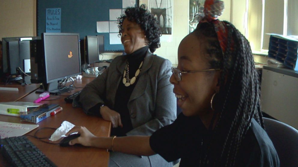 PHOTO: Strawberry Mansion High School principal Linda Cliatt-Wayman talks with Malaysia, a sophomore at the school.