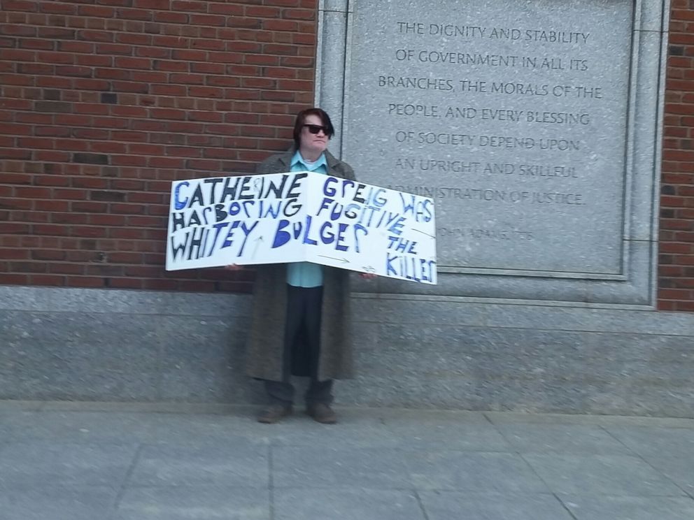 PHOTO: A protester stood outside the courthouse in South Boston , where Whitey Bulgers longtime girlfriend, Catherine Greig, was sentenced to an additional 21 months in prison.