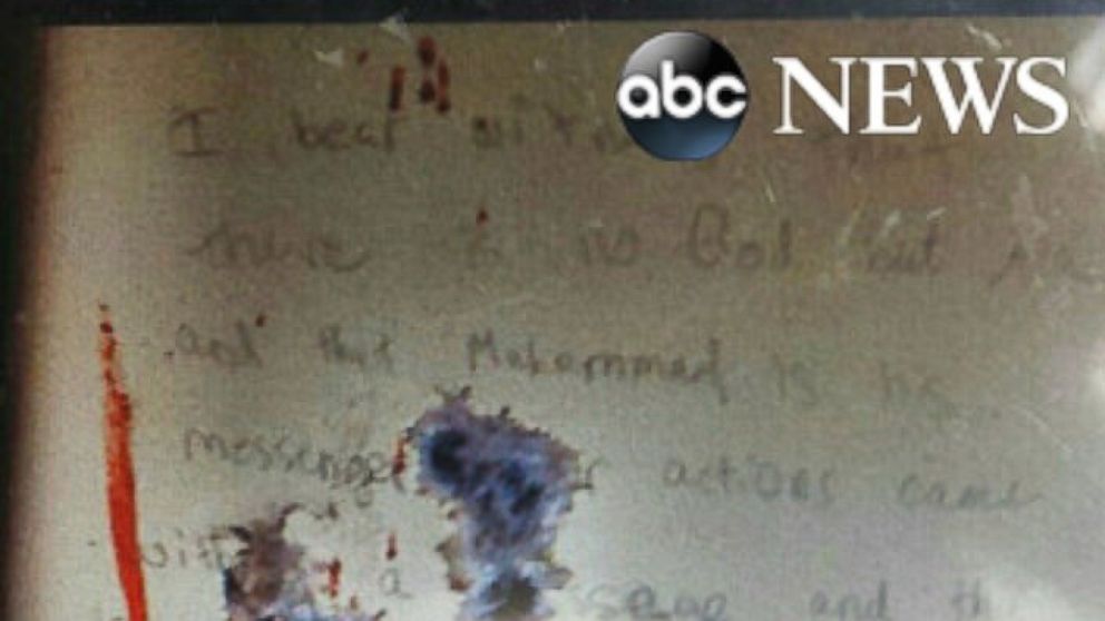 PHOTO: This image, obtained exclusively by ABC News, appears to show the anti-American message allegedly written by Boston Marathon bombing suspect Dzhokhar Tsarnaev on the wall of a boat in which he hid just before being arrested last year.