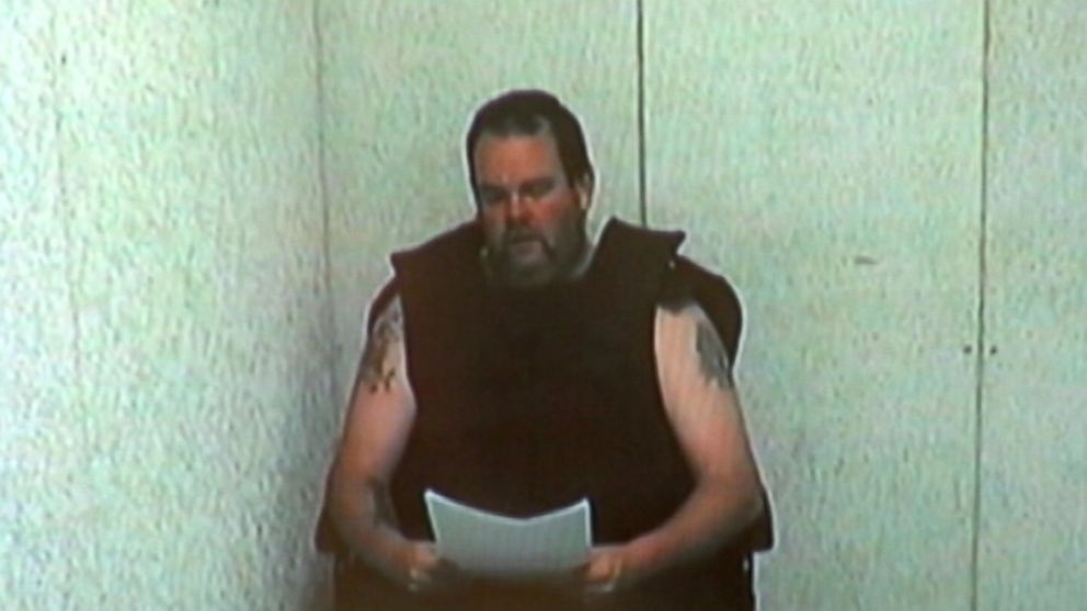 PHOTO: Clinotn Jones reads a statement in court.