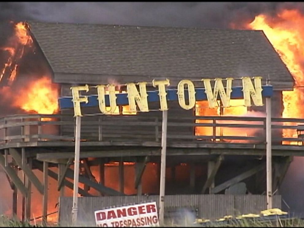 PHOTO: A fire rages at Funtown Pier Amusement Park on the boardwalk in Seaside Heights, N.J., Sept. 12, 2013.