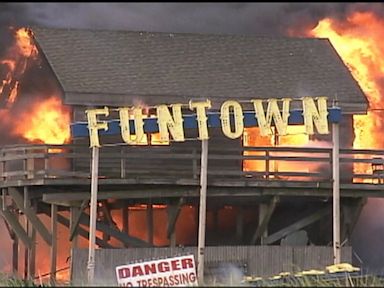 PHOTO: A fire rages at Funtown Pier Amusement Park on the boardwalk in Seaside Heights, N.J., Sept. 12, 2013.