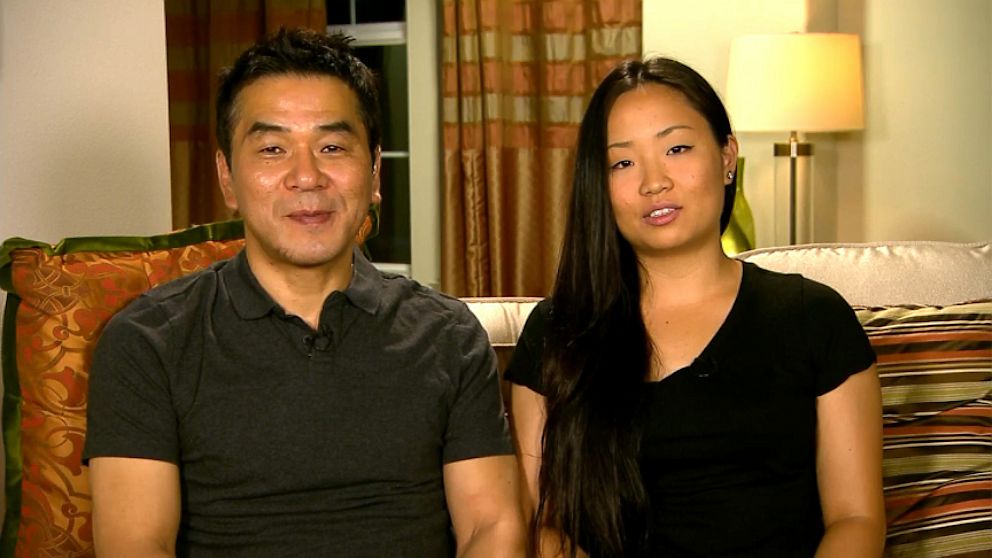 PHOTO: Eugene Rah and Eunice Rah discuss the San Francisco plane crash.