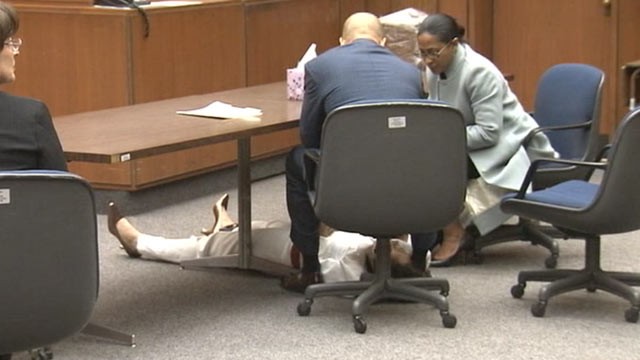PHOTO:A former California Highway Patrol officer collapsed onto the floor just moments after being found guilty of killing her husband three years ago near a freeway off-ramp.