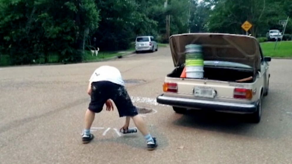 PHOTO: A man who calls himself Chane has taken it upon himself to fix Jackson, Miss. pothole problem.