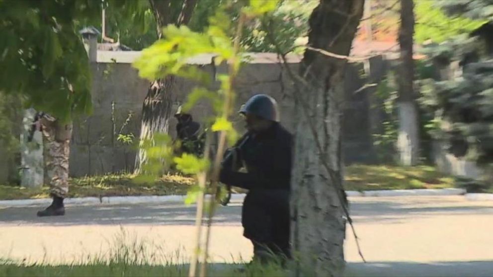 PHOTO: A gunman in Mariupol, Ukraine, where violence erupted seemingly out of nowhere on May 7.