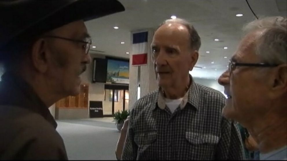 PHOTO: Three brothers separated at birth meet for first time at a Florida airport.