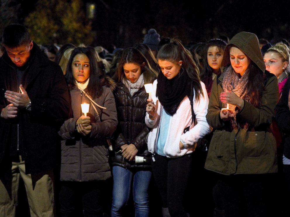 PHOTO: West Virginia Univeristy students hold a candlelight vigil in memory of Nolan Michael Burch in Morgantown, W.Va., Nov. 14, 2014. Burch, 18, died two days after officers were called to the Kappa Sigma house and found someone performing CPR on him.