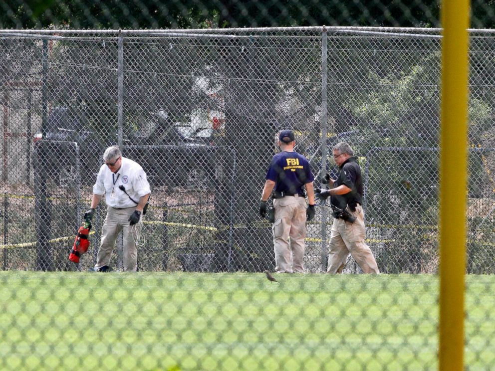 PHOTO: FBI agents continue to search for evidence on the baseball field in Alexandria, Va., June 15, 2017, the day after House Majority Whip Steve Scalise of La. was shot during during a congressional baseball practice.