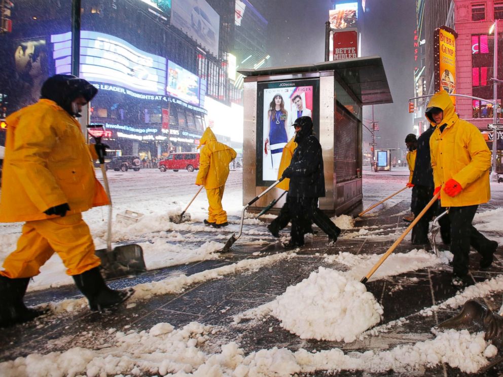 PHOTO: A crew works to remove snow as a snowstorm sweeps through Times Square, March 14, 2017, in New York.
