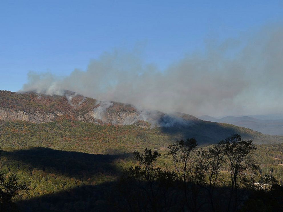 PHOTO: In this Wednesday, Nov. 9, 2016 photo, a wildfire burns near Lake Lure, North Carolina. A state of emergency is in effect for 25 western North Carolina counties where active wildfires are burning, caused by the drought that began last spring.