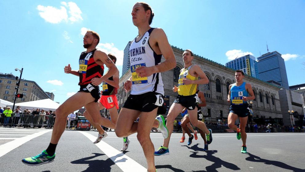 PHOTO: Runners compete in the Invitational Mile on, April 19, 2014, in Boston in advance of the 118th Boston Marathon.
