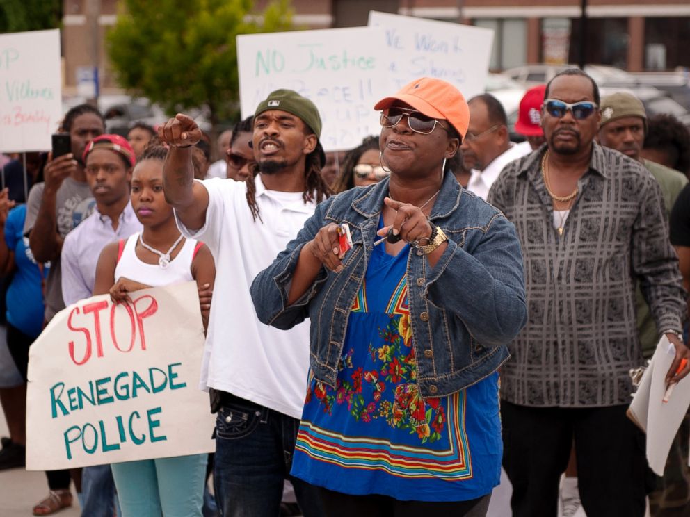 PHOTO: Protestors confront police during an impromptu rally, Aug. 10, 2014 to protest the shooting of Michael Brown, 18, by police in Ferguson, Mo.