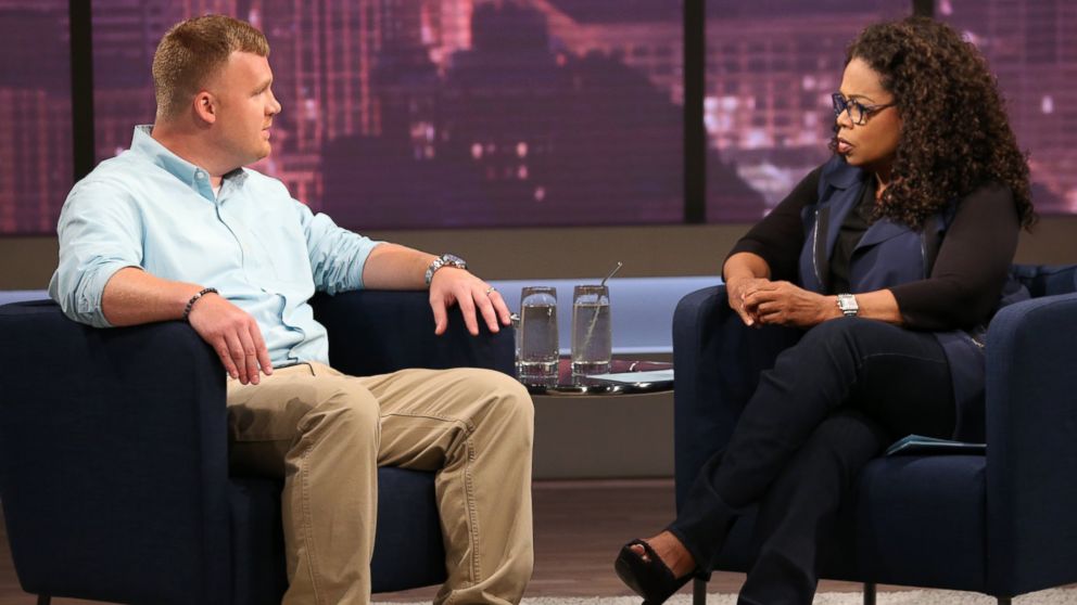Matt Sandusky, the adopted son of former Penn State University assistant football coach Jerry Sandusky, talks with Oprah Winfrey, June 27, 2014.