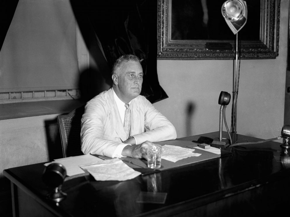 PHOTO: President Franklin D. Roosevelt appeals to the nation via radio for immediate enrollment of all employers under the blanket agreement to raise wages and create jobs, July 24, 1933, in Washington. Within an hour 300 promises had been received.