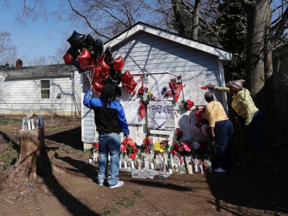 PHOTO: People gather at a makeshift memorial near the scene of a shooting in Raleigh, N.C.,March 1, 2016. Authorities say that a police officer fatally killed a man on Monday while trying to make an arrest for a felony drug charge.