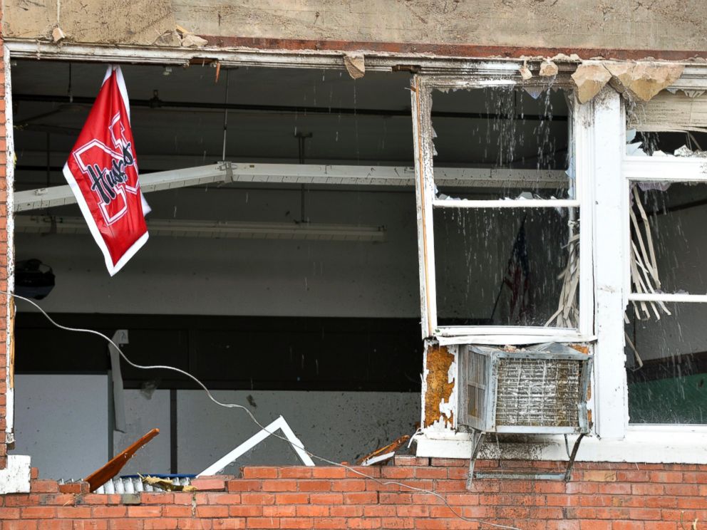 PHOTO: A Husker flag hangs from a window in the heavily damaged school building in Pilger, Neb., June 16, 2014.