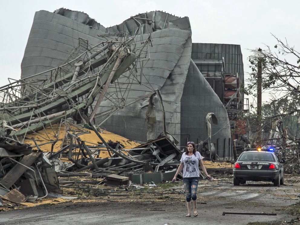 PHOTO: A woman walks down Black Hills Trail road in Pilger, Neb., June 16, 2014.
