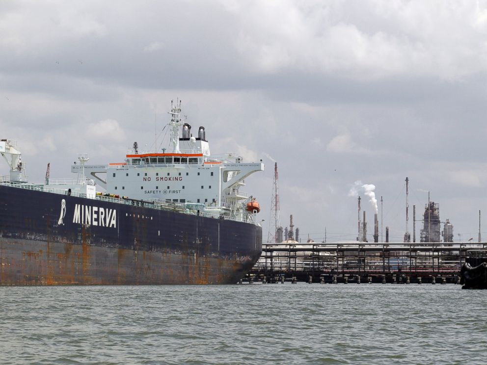 PHOTO: An oil tanker is docked at the Exxon Mobile Baytown complex along the Houston Ship Channel, June 2011 in Baytown, Texas.