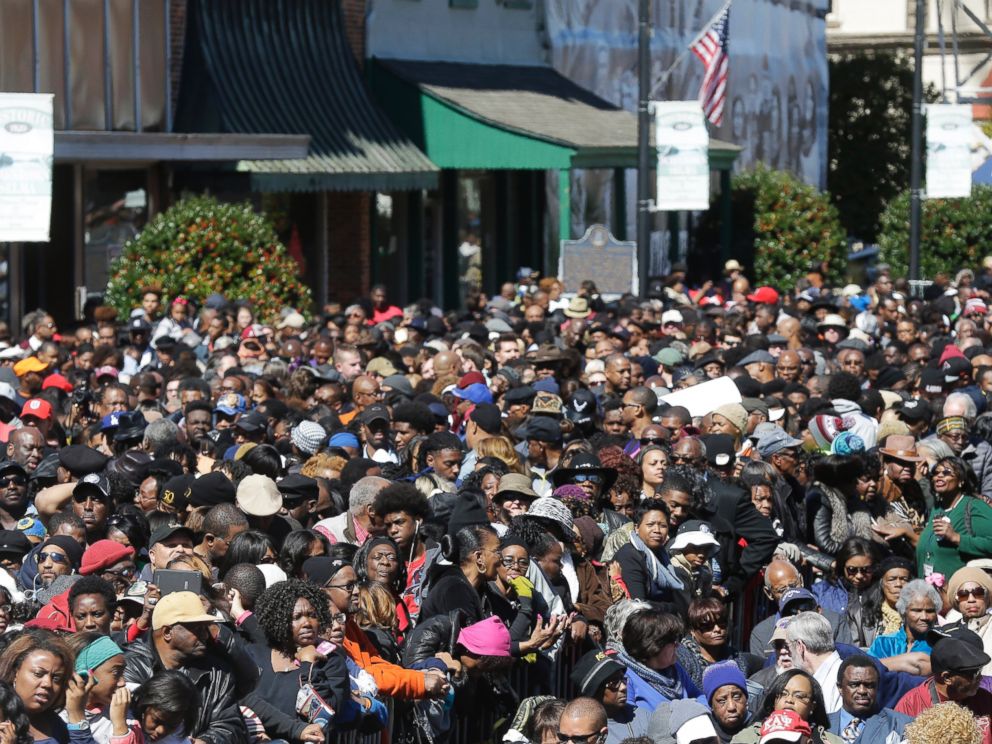 A large crowd forms near a stage where President Barack Obama will speak and then take a symbolic walk across the Edmund Pettus Bridge, Saturday, March 7, 2015, in Selma, Ala. This weekend marks the 50th anniversary of Bloody Sunday.