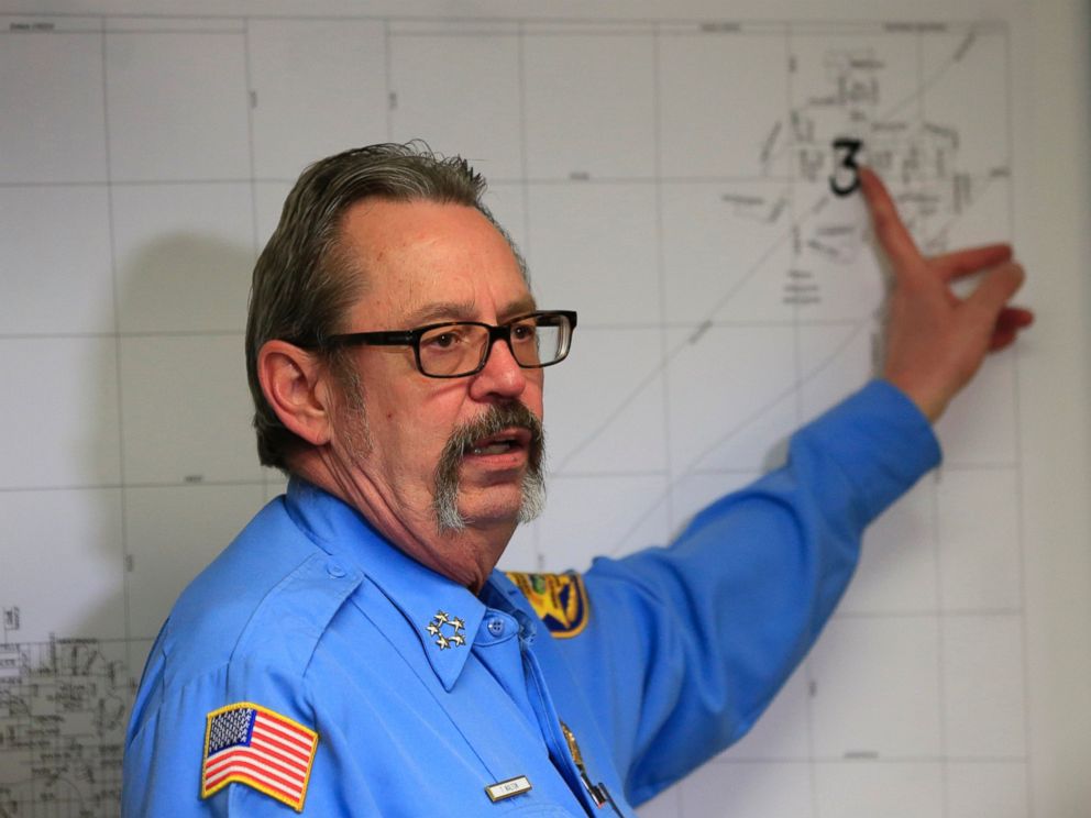 PHOTO: Harvey County Sheriff T. Walton points out one of the shooting locations on a map from Thursdays attack at the Excel Industries during a news conference at the Law Enforcement Center in Newton, Kan., Friday, Feb. 26, 2016.
