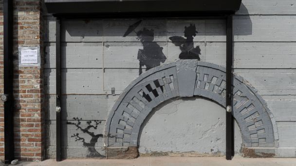 Work by British graffiti artist Banksy is displayed on Saturday, Oct. 19, 2013, in the Brooklyn borough of New York. AP banksy geishas jt 131020 16x9 608 Instant Index: Brooklyn Building Owner Hires Guards to Protect Banksy Work