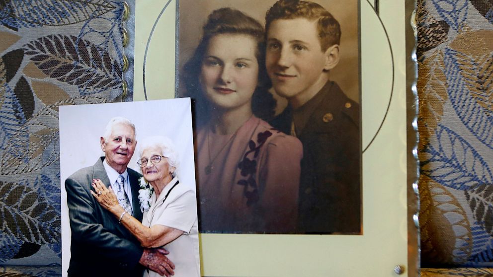 This Aug. 29, 2013 photo, shows images of Robert and Nora Viands, of Rockford, Ill., on their wedding day and on their 50th wedding anniversary. 