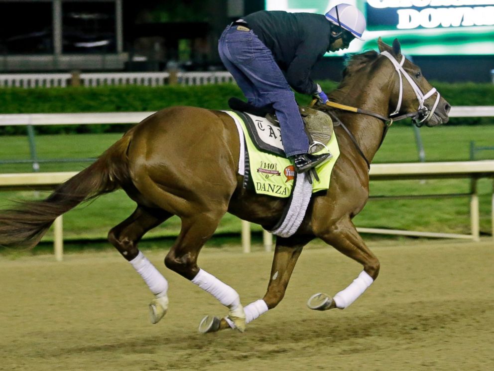 PHOTO: Exercise rider Ezequiel Perez takes Kentucky Derby entrant Danza for a morning workout during a morning workout at Churchill Downs, May 2, 2014, in Louisville, Ky.