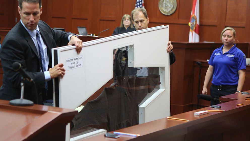 PHOTO: John Guy and Richard Mantei present Trayvon Martins hooded sweatshirt as evidence at Zimmerman trial