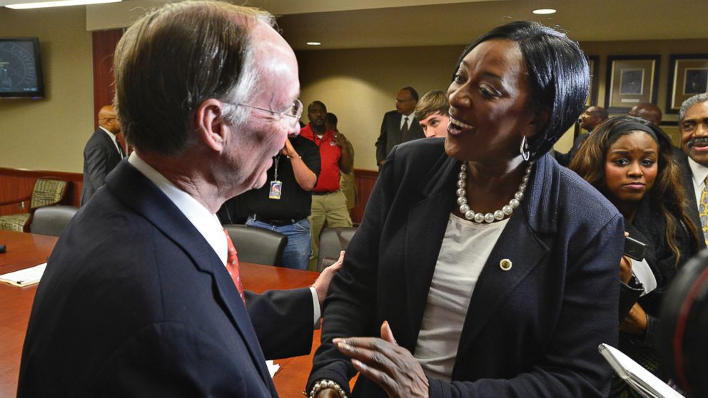 PHOTO: In this file photo, Dr. Gwendolyn Boyd, right, greets Alabama Governor Robert Bentley, left, after the Alabama State University Board of Trustees offered her the presidency of the university on Dec. 20, 2013 at the ASU campus in Montgomery, Ala.