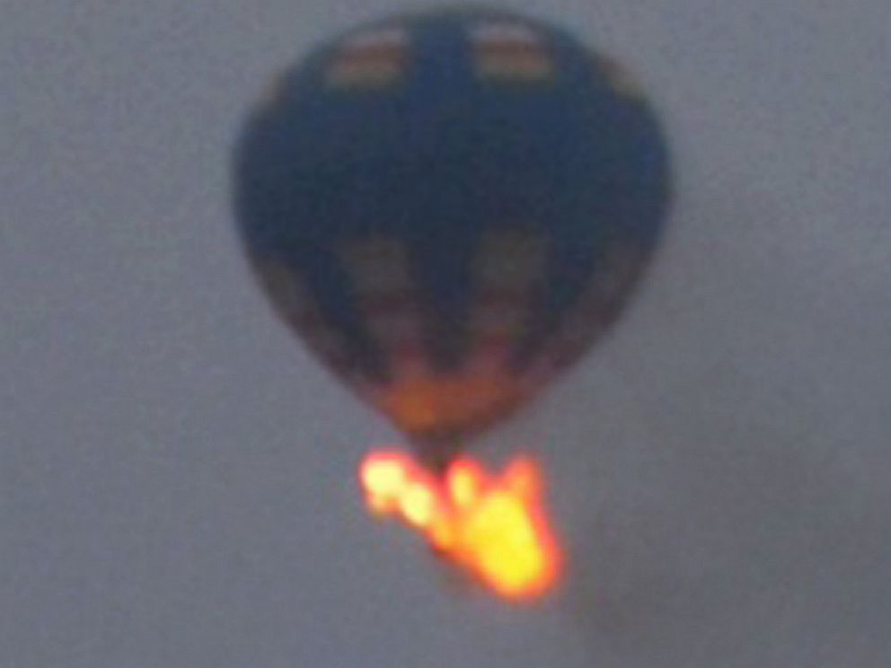 PHOTO: This photo provided by Nancy Johnson shows what authorities say is a hot-air balloon that was believed to have caught fire and crashed in Virginia, Friday, May 9, 2014.