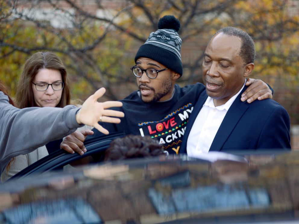 PHOTO: Jonathan Butler, center, enters a car as he leaves the University of Missouri campus, Nov. 9, 2015, after he ended his hunger strike in Columbia, Mo.