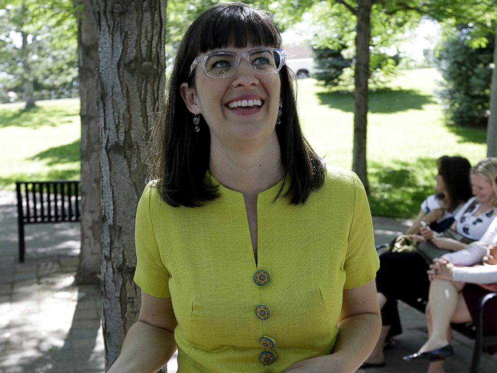PHOTO: Kate Kelly speaks with reporters during her vigil, June 22, 2014, in Salt Lake City.